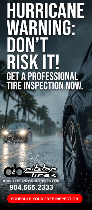 Vertical promotional banner for hurricane tire safety from ab Pitstop Tires in Jacksonville Beach. A close-up of a tire in heavy coastal rain. The headline states, "HURRICANE WARNING: DON'T RISK IT! GET A PROFESSIONAL TIRE INSPECTION NOW." Call "904.565.2333" or click to "SCHEDULE YOUR FREE INSPECTION."